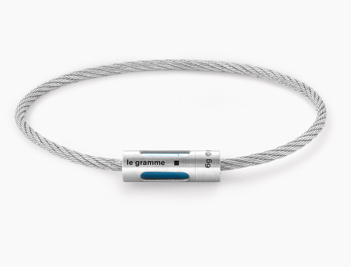 bracelet câble perforé bleu le 9g